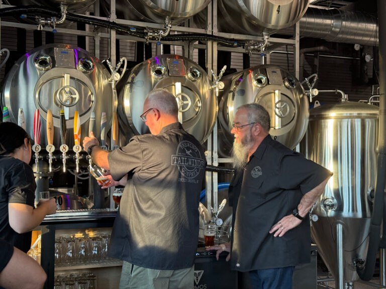 Tailwinds Brewing Company pouring beer