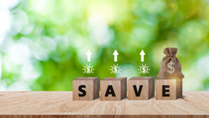 wooden-blocks-with-words-save-and-money-bag-with-coins-for_24744759